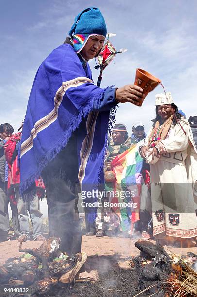 Evo Morales takes part in a traditional Aymara ceremony, blessing his candidacy for President and offering 2 burning llama fetuses to the "Mother...