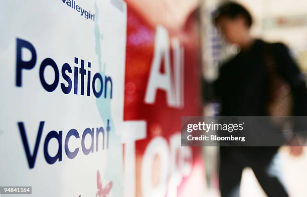 Vacant position is advertised on a shop window sign, in Sydney, Australia, on Monday, May 5, 2008. Australian job-vacancy advertisements rose in...