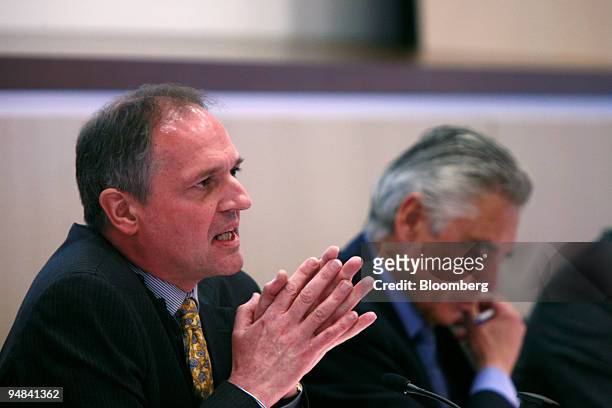 Paul Polman, left, Nestle chief financial officer speaks at a news conference in Vevey, Switzerland, Thursday, February 23, 2006. Nestle SA, the...