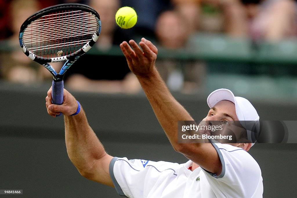 Andy Roddick of the U.S. serves in his first round match aga