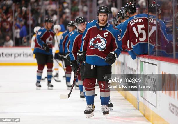 Members of the Colorado Avalanche congratulate Colorado Avalanche left wing Gabriel Landeskog following a third period goal during a first round...