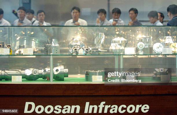 Construction equipment is displayed on the production line at Doosan Infracore Co.'s plant in Changwon, South Korea, on Friday, Sept. 26, 2008....