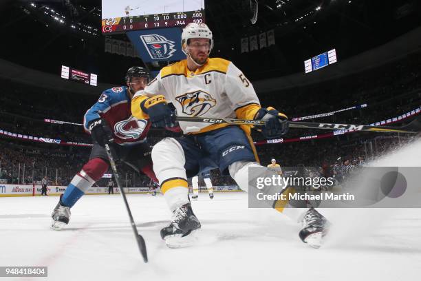 Roman Josi of the Nashville Predators skates against Matt Nieto of the Colorado Avalanche in Game Four of the Western Conference First Round during...