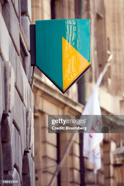 The company logo for ABN Amro hangs in front of the Fortis company flag outside their headquarters in Brussels, Belgium, on Friday, Sept. 26, 2008....