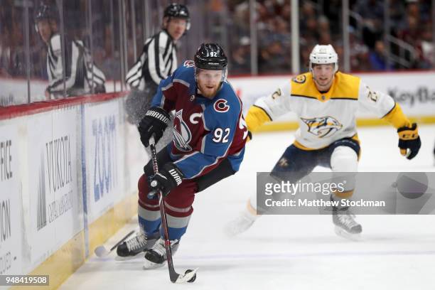 Gabriel Landeskog of the Colorado Avalanche advances the puck against the Nashville Predators in Game Four of the Western Conference First Round...