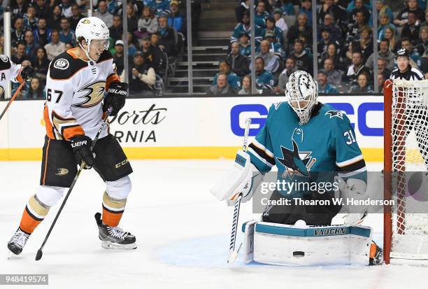 Goalie Martin Jones of the San Jose Sharks blocks a shot against Rickard Rakell of the Anaheim Ducks during the third period in Game Four of the...