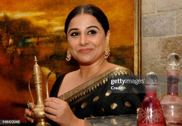 Indian Bollywood actress Vidya Balan attends the Disneys Aladdin Broadway-style musical show in Mumbai on April 18, 2018. / AFP PHOTO / -