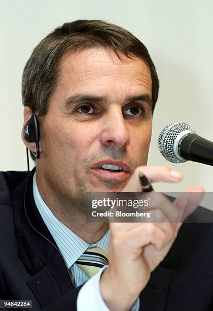 Mitsubishi Fuso Truck & Bus Corp. President and CEO Wilfried Porth speaks to reporters at a news conference in Tokyo Wednesday, April 21, 2004. Fuso,...