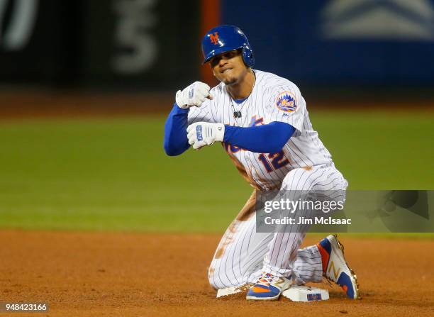 Juan Lagares of the New York Mets reacts after his eighth inning two run double against the Washington Nationals at Citi Field on April 18, 2018 in...