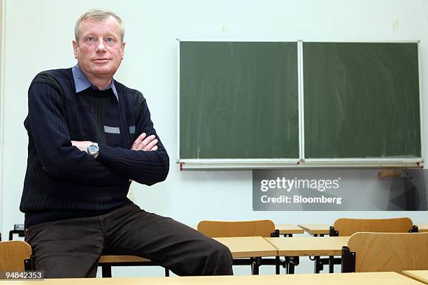 Wolfgang Renner, a math and physics teacher at the Clara Zetkin Middle School, poses in a classroom at the school in Freiberg, Germany, on Thursday,...