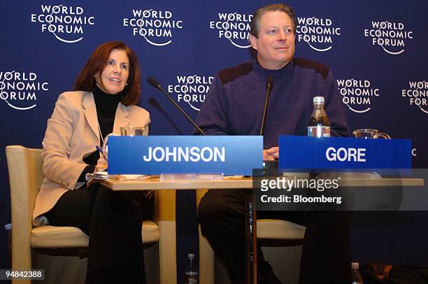Suzanne Nora Johnson, left, chairman of the Global Markets Institute, Goldman Sachs Group and former US Vice-President Al Gore participate in a...