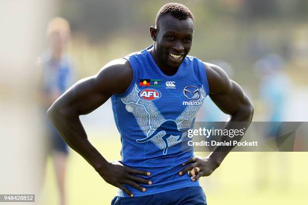 Majak Daw of the Kangaroos in action at Arden Street Ground on April 19, 2018 in Melbourne, Australia.