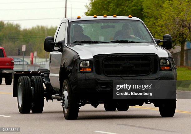 New 2005 Ford "Super Truck" is test driven on the road outside the Kentucky Ford Truck plant in Louisville, Kentucky, April 19, 2004. The front grill...