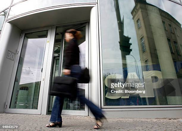 Pedestrian passes an SAP AG office in Berlin, Germany, on Wednesday, April 30, 2008. SAP AG, the world's biggest maker of business-management...