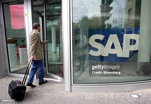 Visitor enters an SAP AG office in Berlin, Germany, on Wednesday, April 30, 2008. SAP AG, the world's biggest maker of business-management software,...