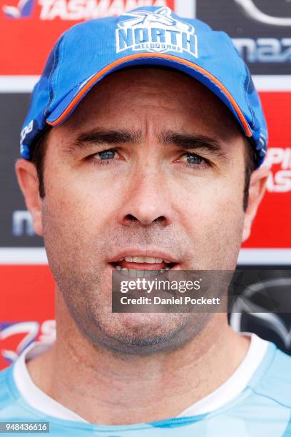 Kangaroos head coach Brad Scott talks to the media at Arden Street Ground on April 19, 2018 in Melbourne, Australia.