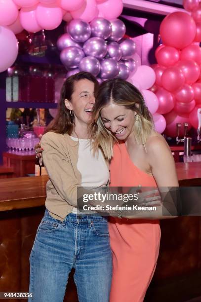 Phoebe Dean and Emily Schuman attend Cupcakes and Cashmere Ten Year Anniversary Party at Trunk Club on April 18, 2018 in Culver City, California.