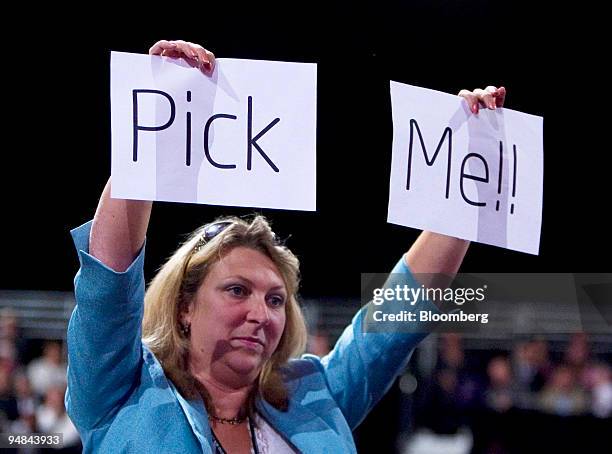 Labour Party delegate signals during a question and answer session on day four of annual Labour Party Conference at the Manchester Central conference...