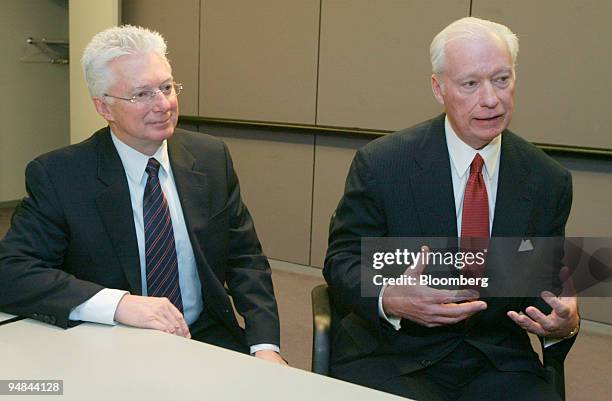 Procter & Gamble Chairman and CEO A.G. Lafley, left, and Gillette Chairman and CEO James Kilts speak to the media January 28 in New York. Procter &...