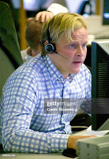 Trader Tor Olav Bogen works on the stock trading floor at DnB NOR headquarters in Oslo, Norway, on Monday, Sept. 22, 2008. Stocks in Europe and Asia...