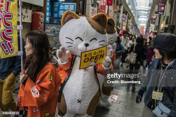 Mascot advertises the opening of a store in the Koenji neighborhood in Tokyo, Japan, on Saturday, April 14, 2018. Japan's headline inflaThe Japanese...