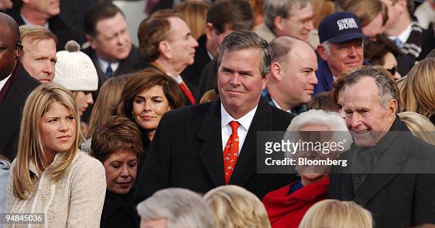 First daughter Jenna Bush, left, looks on as Florida Governor Jeb Bush, former First Lady Barbara Bush and former US President George H.W. Bush pose...