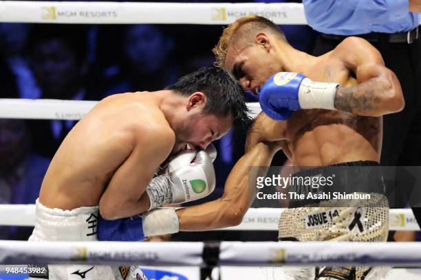 Challenger Cristofer Rosales of Nicaragua connects his right on former champion Daigo Higa of Japan in the 6th round of the WBC Flyweight Title Bout...