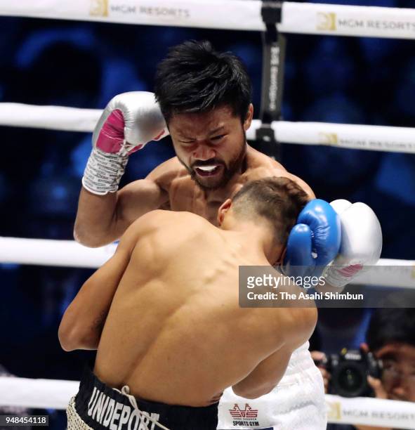 Former champion Daigo Higa of Japan and Challenger Cristofer Rosales of Nicaragua exchange punches in the 1st round during the WBC Flyweight Title...