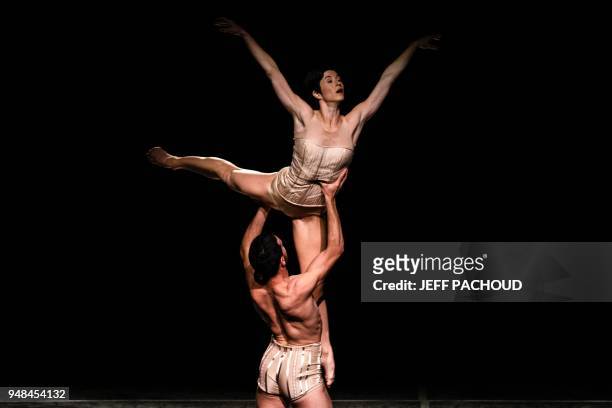 Dancers perform on stage, on April 18, 2018 at the Lyon Opera, during the dress rehearsal of Czech choreographer Jiri Kylian's creation "Petite...