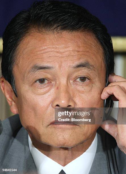 Taro Aso, secretary general of the Liberal Democratic Party and a candidate for the president of the LDP, speaks during a debate with other...