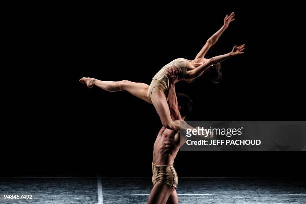 Dancers perform on stage, on April 18, 2018 at the Lyon Opera, during the dress rehearsal of Czech choreographer Jiri Kylian's creation "Petite...