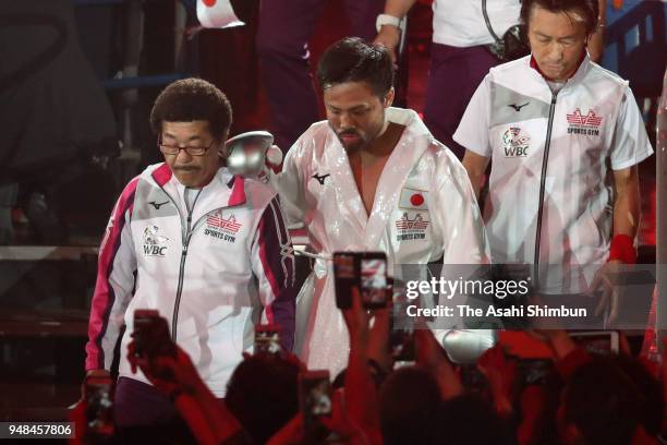 Former champion Daigo Higa of Japan enters the ring with coach Yoko Gushiken prior to the WBC Flyweight Title Bout at Yokohama Arena on April 15,...