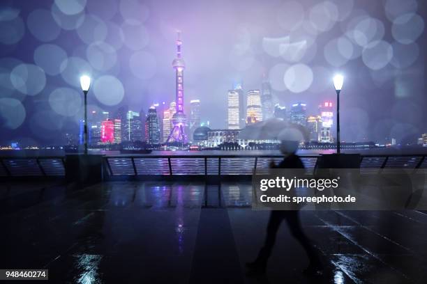 china, shanghai skyline at rainy night - asia rain stock pictures, royalty-free photos & images