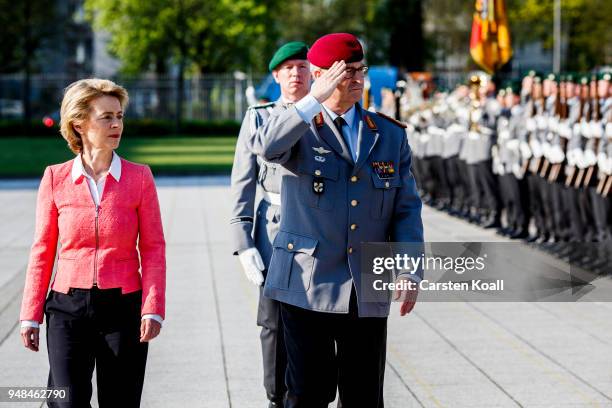 Soldiers of the Bundeswehr march past German Defense Minister Ursula von der Leyen and new Bundeswehr Chief of Staff Eberhard Zorn passing the guard...