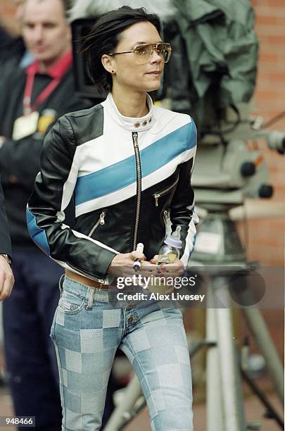 Victoria Beckham celebrates as Manchester United are crowned FA Carling Premier League Champions after the match against Derby played at Old Trafford...