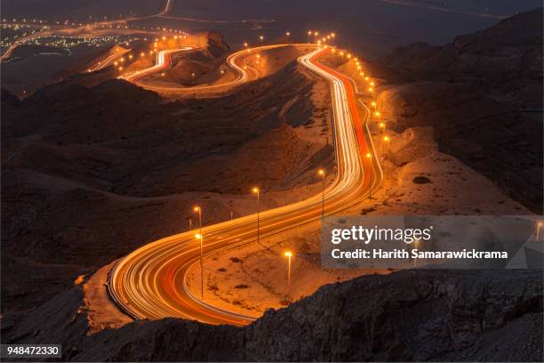 jebel hafeet mountain, al ain - abu dhabi - abu dhabi night stock pictures, royalty-free photos & images