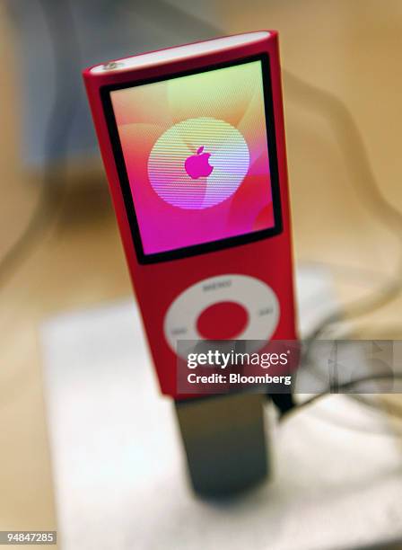 An iPod Nano sits on display at an Apple store in New York, U.S., on Friday, Sept. 12, 2008. This week, Apple Inc. Chief Executive Officer Steve Jobs...