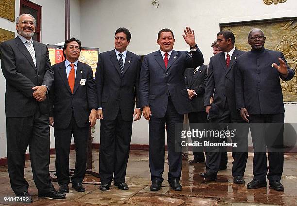 From left: Presidents of Bolivia, Carlos Meza; Peru, Alejandro Toledo; Panama, Martin Torrijos; Venezuela, Hugo Chavez; Guayana, Bharrat Jagdeo; and...