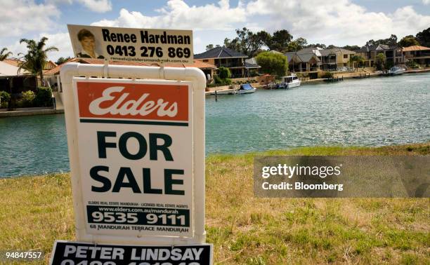 Sign advertises property for sale in the Mandurah Canals, south of Perth, Western Australia, on Saturday, Nov. 22, 2008. Australia's leading economic...