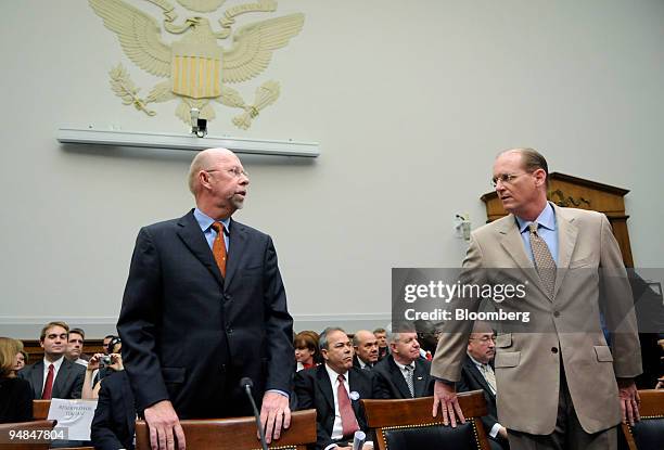 Doug Steenland, president and chief executive officer of Northwest Airlines Corp., left and Richard Anderson, chief executive officer of Delta...