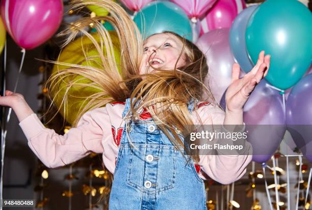 portrait of girl at a party - birthday balloon stock pictures, royalty-free photos & images