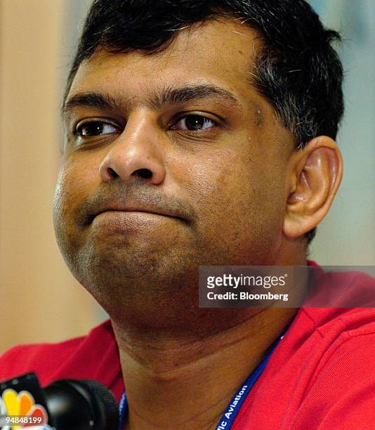 AirAsia Bhd. Chief executive Tony Fernandes listens to a question at a press briefing at the Asia Pacific & Middle East Aviation and Tourism Outlook...