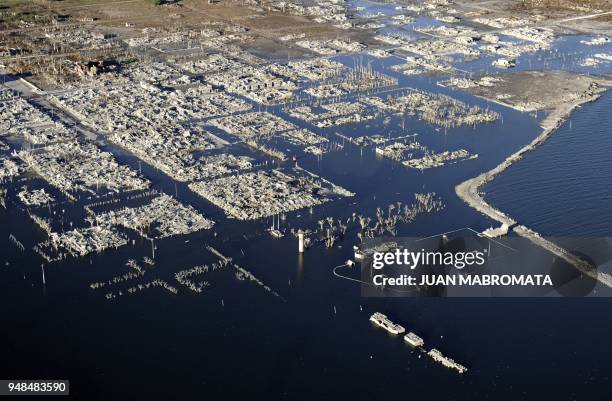 By Oscar Laski Aerial picture of Lago Epecuen village, some 600 km southwest of Buenos Aires, taken on May 4, 2011 after it remained flooded for...