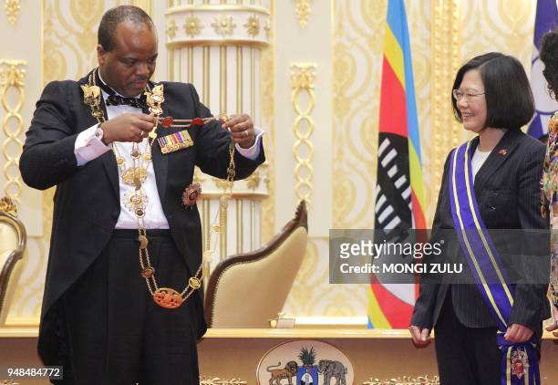 Swaziland absolute Monarch King Mswati III bestows the Order of the Elephant to Taiwan President Tsai Ing-wen during her visit to the Kingdom of...