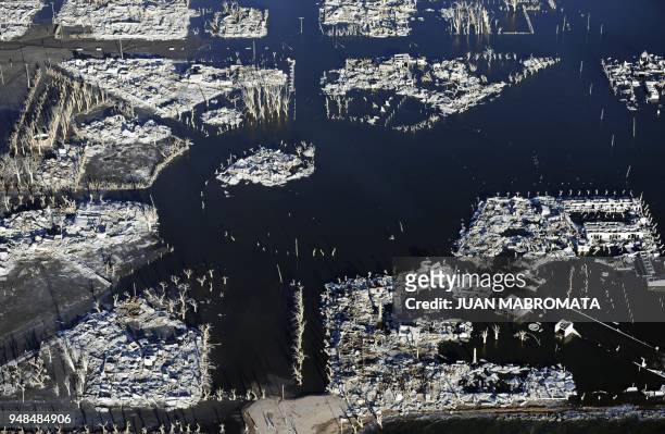 By Oscar Laski Aerial picture of Lago Epecuen village, some 600 km southwest of Buenos Aires, taken on May 4, 2011 after it remained flooded for...