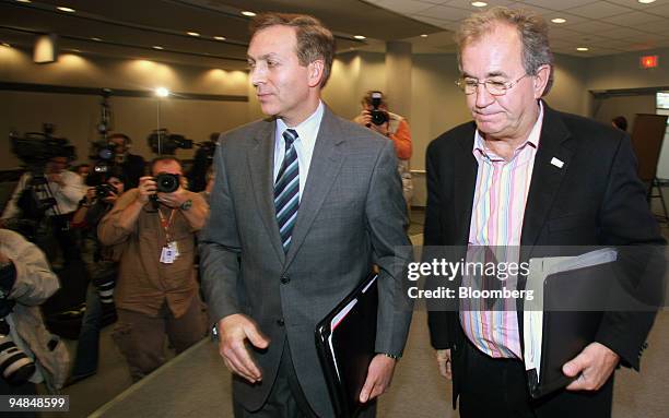 Michael Grimaldi, left, president and general manager of General Motors Canada LTD, and Basil "Buzz" Hargrove, president of Canadian Auto Workers,...