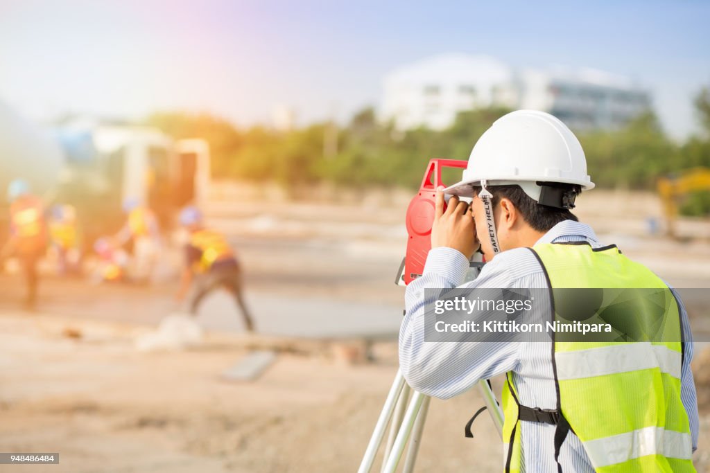 Asian Construction engineer checking construction site for new Infrastructure construction project. photo concept for engineering work