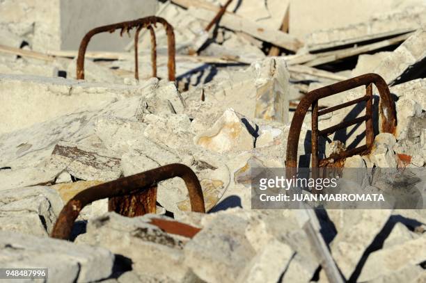 By Oscar Laski Rusty bed are seen under the ruins of Lago Epecuen village, some 600 km southwest of Buenos Aires, on May 3, 2011 after the place...