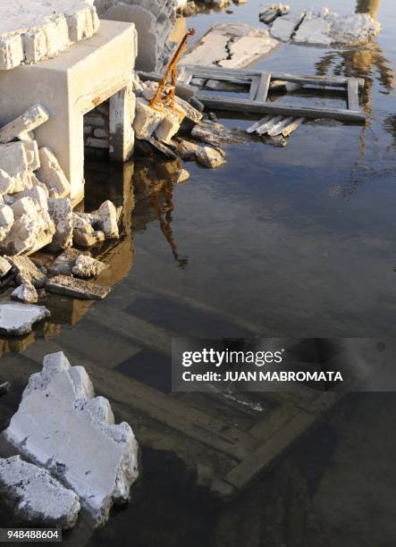 By Oscar Laski Picture showing part of the ruins of Lago Epecuen village, some 600 km southwest of Buenos Aires, taken on May 3, 2011 after it...