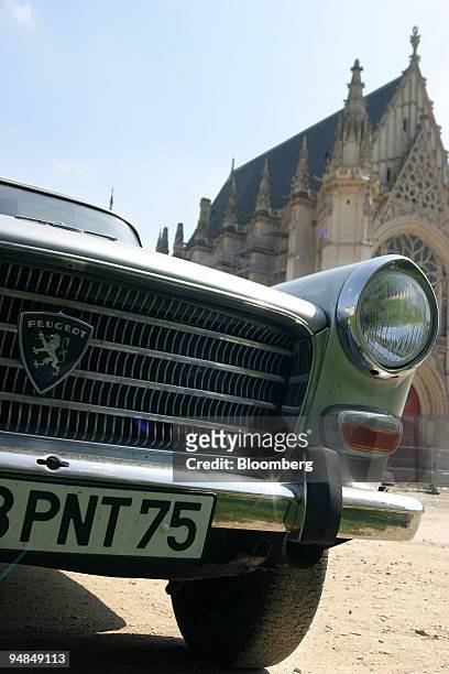 1960s Peugeot 404 automobile is seen in Vincennes, near Paris, France, Monday, April 12, 2004. Western European car sales fell in October for a...
